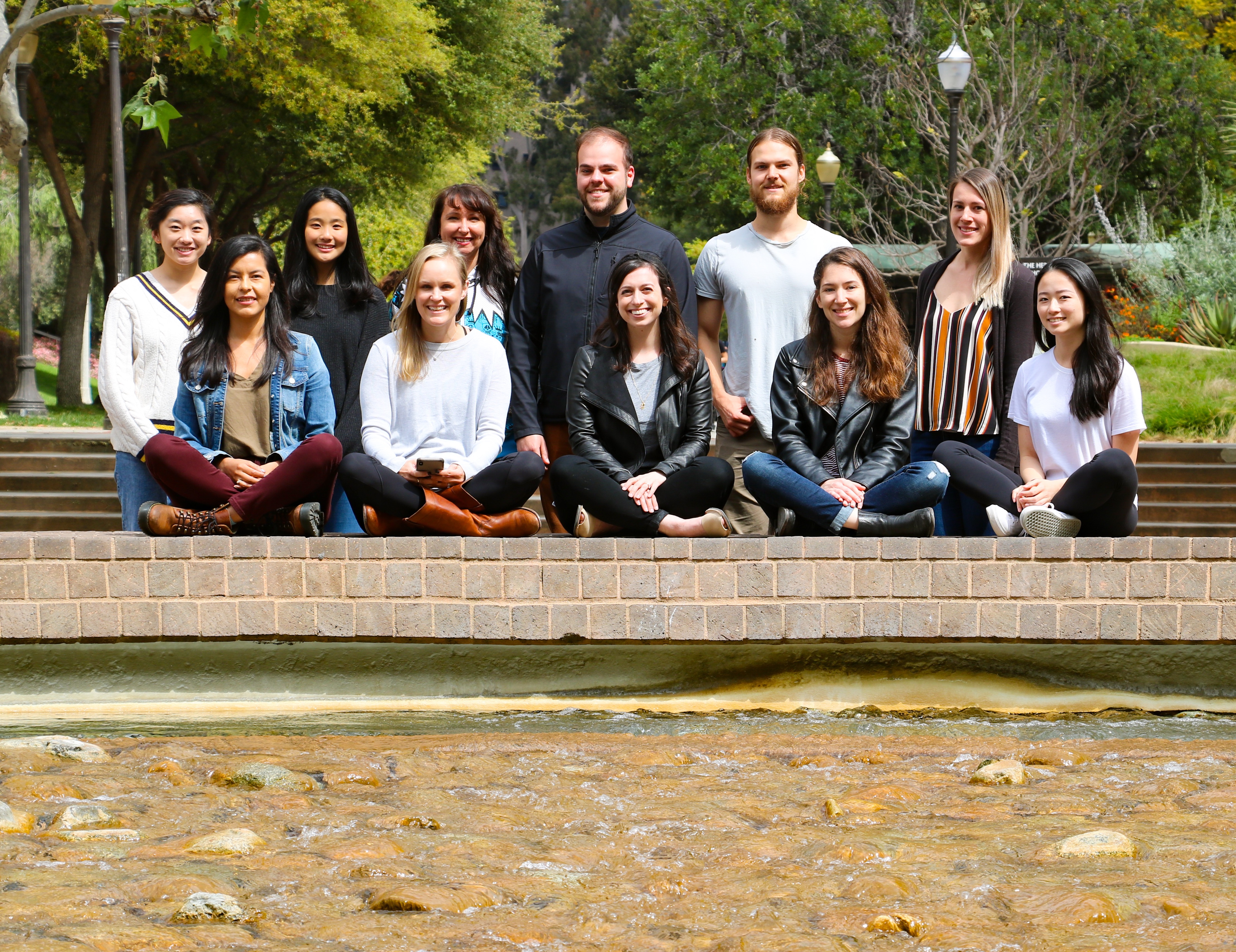 Dr. Wassum (front, second from left) with her lab at UCLA.