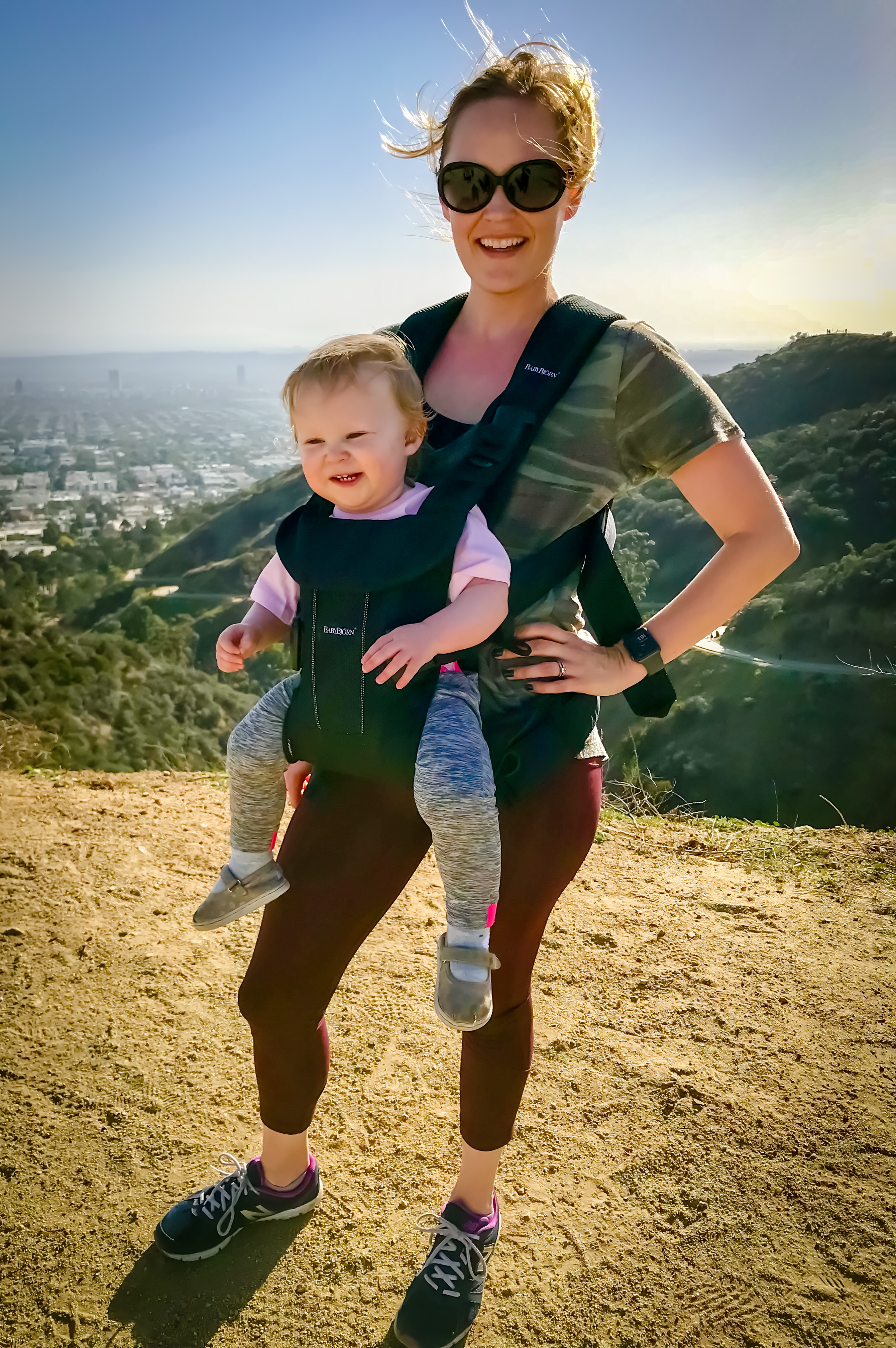 Dr. Wassum hiking with her daughter. When asked how she decompresses after a rough day, she said, I play with my daughter and drink some good wine. This never fails.